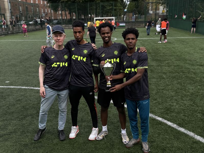 Our players with a tournament cup